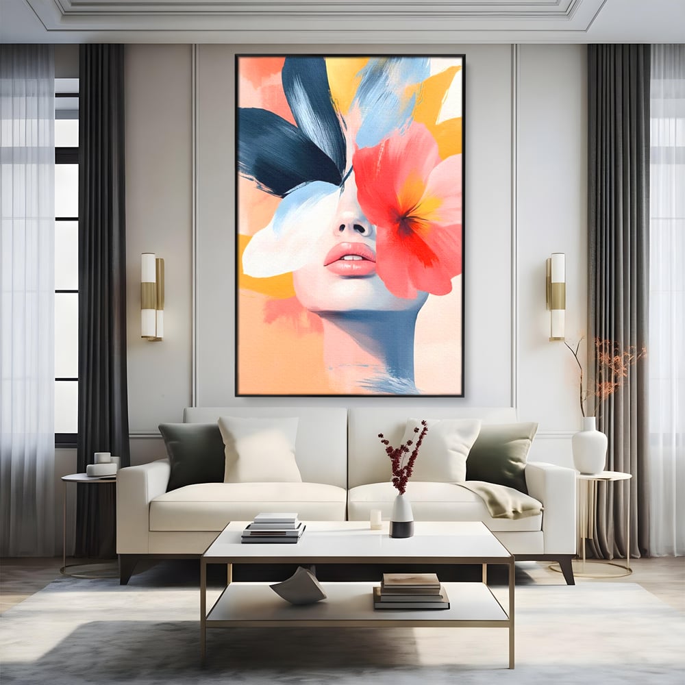 Tablou canvas cu tablou canvas cu fata de femeie si flori pictate, in rama de aluminiu negru, pe perete intr-un living